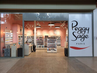 presentoir-sante-beaute-en-metal-pour-produits-cosmetique-PEGGY-SAGE-enseigne
